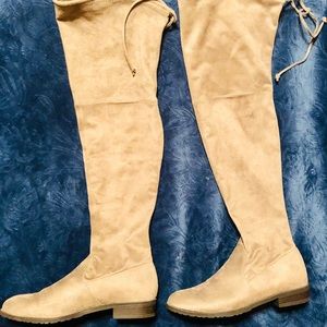 Semi-New flat High knee tan boots.
